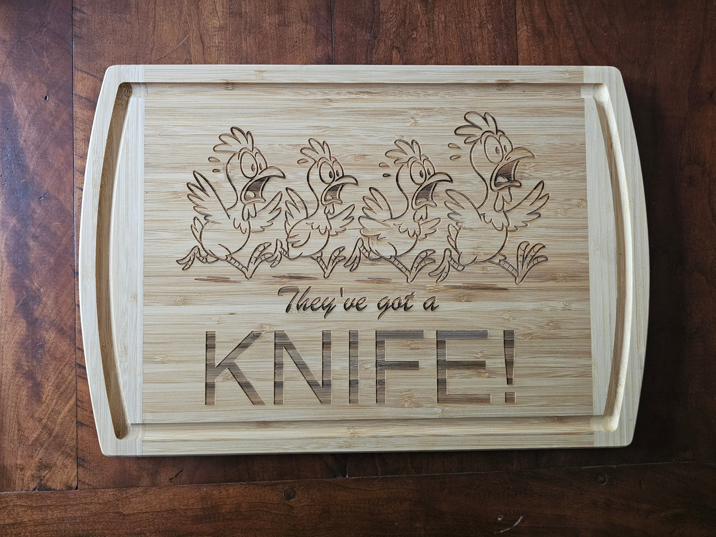 Running Away Chickens Cutting Board
